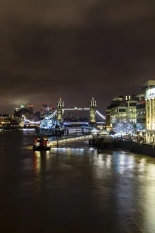 Tower Bridge and HMS Belfast on River Thames at night, London, England, United Kingdom, Europe Tower Bridge and HMS Belfast on River Thames at night, London, England, United Kingdom, Europe