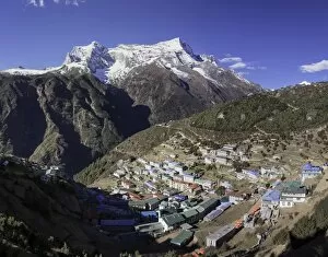 The town of Namche Bazaar with the Kongde Ri (Kwangde Ri) mountain range in the background, Himalayas, Nepal, Asia