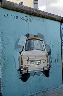 Images Dated 30th July 2008: A Trabant car painted on a section of the Berlin Wall