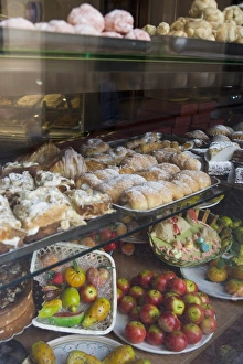 Traditional marzipan fruits and pastries in shop window Traditional marzipan fruits and pastries in shop window