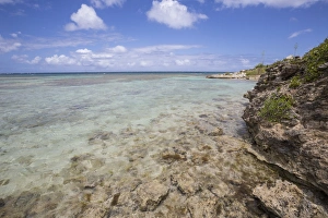 The turquoise shades of the Caribbean Sea seen from the cliffs of Green Island The turquoise shades of the Caribbean Sea seen from the cliffs of Green Island
