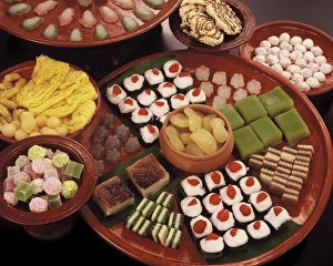 A variety of Thai sweets, made from coconut cream, egg yolk and sweet tapioca A variety of Thai sweets, made from coconut cream, egg yolk and sweet tapioca