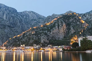Venetian built fort with bastions highlighted by lights at twilight, Kotor, Montenegro Venetian built fort with bastions highlighted by lights at twilight, Kotor, Montenegro
