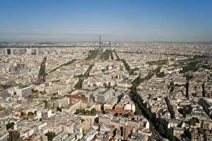 View of city with the Eiffel Tower in distance, from the Tour Montparnasse, Paris, France View of city with the Eiffel Tower in distance, from the Tour Montparnasse, Paris, France