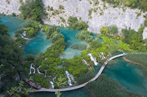 View over a footbridge in the lower Plitvice Lakes National Park, UNESCO World Heritage Site View over a footbridge in the lower Plitvice Lakes National Park, UNESCO World Heritage Site