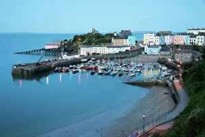 Lit Up Collection: View over harbour and castle, Tenby, Carmarthen Bay, Pembrokeshire, Wales, United Kingdom