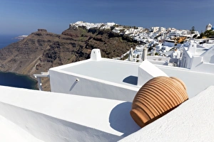 View towards Imerovigli and Oia from Firostefani showing villages clinging to cliffs View towards Imerovigli and Oia from Firostefani showing villages clinging to cliffs