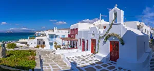 View of little white chapel and Little Venice, Mykonos Town, Mykonos, Cyclades Islands View of little white chapel and Little Venice, Mykonos Town, Mykonos, Cyclades Islands
