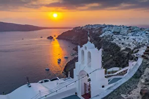 View of Oia village at sunset, Santorini, Aegean Island, Cyclades Island, Greek Islands