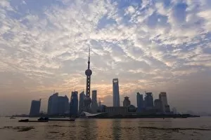 Images Dated 3rd November 2007: View of Oriental Pearl TV Tower and highrises in the Pudong New Area viewed across the Huangpu