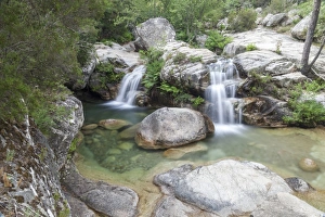 View of the Purcaraccia waterfalls and natural pools in summer, Punta di Malanda View of the Purcaraccia waterfalls and natural pools in summer, Punta di Malanda