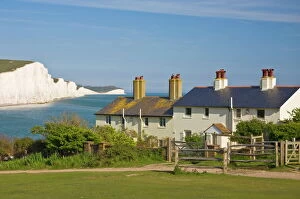 National Parks Gallery: View of The Seven Sisters cliffs, the coastguard cottages on Seaford Head