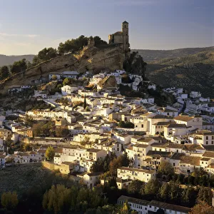 View over the whitewashed houses and old Moorish castle at sunset, Montefrio View over the whitewashed houses and old Moorish castle at sunset, Montefrio