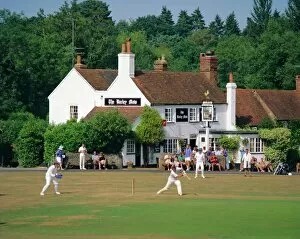 Play Collection: Village green cricket, Tilford, Surrey, England, UK