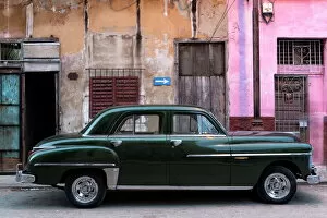 Images Dated 20th March 2014: Vintage American car parked on a street in Havana Centro, Havana, Cuba, West Indies, Caribbean