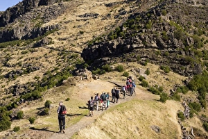 Walkers stride out on a marked footpath on the Pico Ruivo on the island of Madeira Walkers stride out on a marked footpath on the Pico Ruivo on the island of Madeira