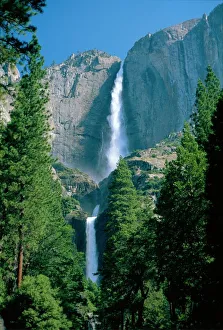 Waterfalls swollen by summer snowmelt at the Upper Waterfalls swollen by summer snowmelt at the Upper