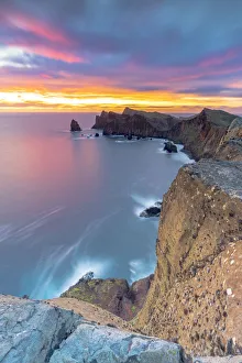 Waves crashing on cliffs at dawn, Ponta Do Rosto, Sao Lourenco Peninsula, Canical Waves crashing on cliffs at dawn, Ponta Do Rosto, Sao Lourenco Peninsula, Canical