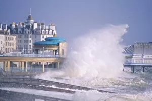 Crashing Gallery: Waves pounding bandstand in a storm on the south coast, Eastbourne, East Sussex