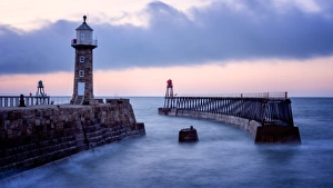 Whitby Pier at sunset, Yorkshire, England, United Kingdom, Europe Whitby Pier at sunset, Yorkshire, England, United Kingdom, Europe