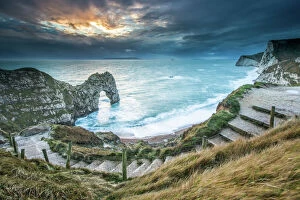 Steps Gallery: A winter sunset at Durdle Door on the Jurassic Coast, UNESCO World Heritage Site