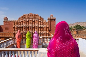 Women in bright saris in front of the Hawa Mahal (Palace of the Winds), built in 1799, Jaipur, Rajasthan, India, Asia Women in bright saris in front of the Hawa Mahal (Palace of the Winds), built in 1799, Jaipur, Rajasthan, India, Asia