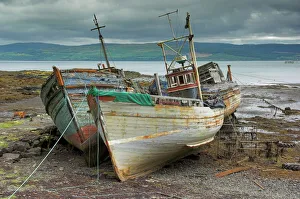 Wrecked fishing boats in gathering storm, Salen Print