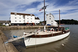 Yacht moored by the Tide Mill at Woodbridge Riverside, Woodbridge, Suffolk, England, United Kingdom, Europe Yacht moored by the Tide Mill at Woodbridge Riverside, Woodbridge, Suffolk, England, United Kingdom, Europe