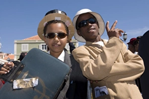 Young men dressed as businesspeople during Carnival, Mindelo, Sao Vicente Young men dressed as businesspeople during Carnival, Mindelo, Sao Vicente