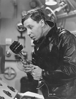 Images Dated 15th January 2011: George Formby in Marcel Varnels Let George Do It! (1940)