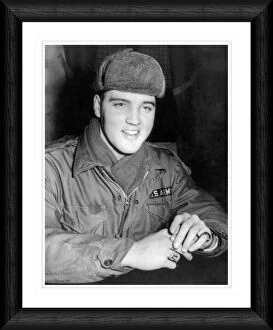 Images Dated 25th March 2008: Elvis Presley in Military Uniform Framed Print