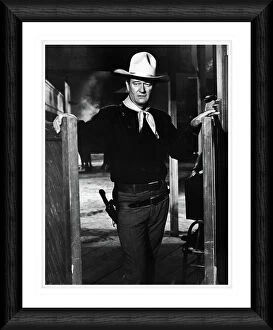 TV & Film Collection: John Wayne Saloon Doors Framed Print