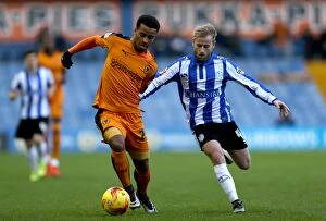Soccer Football Collection: Wolverhampton Wanderers vs Sheffield Wednesday: Nathan Byrne vs Barry Bannan - Intense Battle in