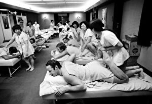 Images Dated 18th September 2012: The 1972 Great Britain Olympic luge team relax in a bathouse in Sapporo, Japan