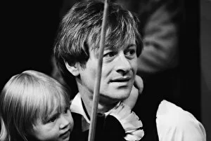 Snooker Gallery: Alex Higgins with his daughter at the 1983 World Snooker Championships