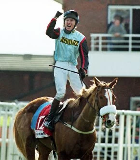 Images Dated 13th March 1997: AP McCoy on the Mr Mulligan celebrates winning the 1997 Cheltenham Gold Cup