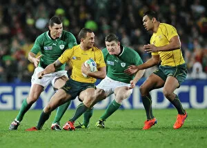 Images Dated 17th September 2011: Brian O Driscoll bears down on Quade Cooper during the 2011 World Cup