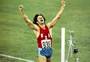 Images Dated 5th January 2012: Bruce Jenner celebrates winning decathlon gold at the 1976 Montreal Olympics