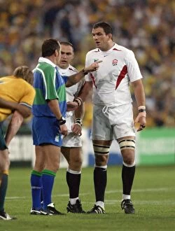 Images Dated 19th April 2001: England captain Martin Johnson and referee Andre Watson exchange words during the 2003 World Cup