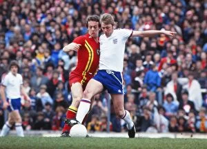 Images Dated 13th May 1978: Englands Brian Greenhoff and Wales Alan Curtis - 1978 Home Championship