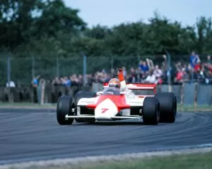 Images Dated 18th July 1981: John Watson waves to the crowd after Silverstone victory 1981