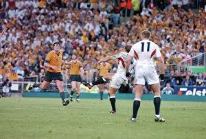 Images Dated 4th June 2001: Jonny Wilkinson strikes the World Cup-winning drop goal
