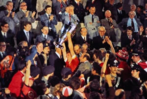 Liverpool captain Emlyn Hughes lifts the European Cup in 1977 Liverpool captain Emlyn Hughes lifts the European Cup in 1977