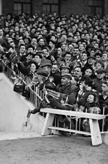 Images Dated 5th December 2008: Manchester United fans cheer their team onto the field before the 1958 FA Cup semi-final