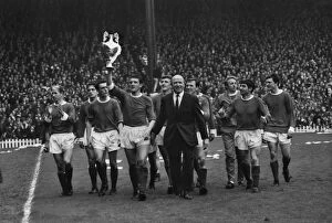 Images Dated 10th February 2011: The Manchester United team do a lap of honour with manager Matt Busby after winning the league