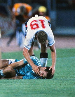 Paul Gascoigne check on Thomas Berthold before being booked in the semi-final of the 1990 Paul Gascoigne check on Thomas Berthold before being booked in the semi-final of the 1990