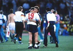 Paul Gascoigne is consoled by Tony Dorigo after England are knocked out of the 1990 World Paul Gascoigne is consoled by Tony Dorigo after England are knocked out of the 1990 World