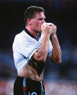 Paul Gascoigne kisses his shirt in celebration after victory over Cameroon at Italia 90 Paul Gascoigne kisses his shirt in celebration after victory over Cameroon at Italia 90