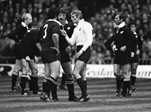 Images Dated 10th April 2013: Referee Roger Quittenton lectures New Zealands Billy Bush as captain Graham Mourie looks