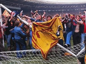 Images Dated 4th June 1977: Scotland fans break up the Wembley goalposts - 1977 British Home Championship